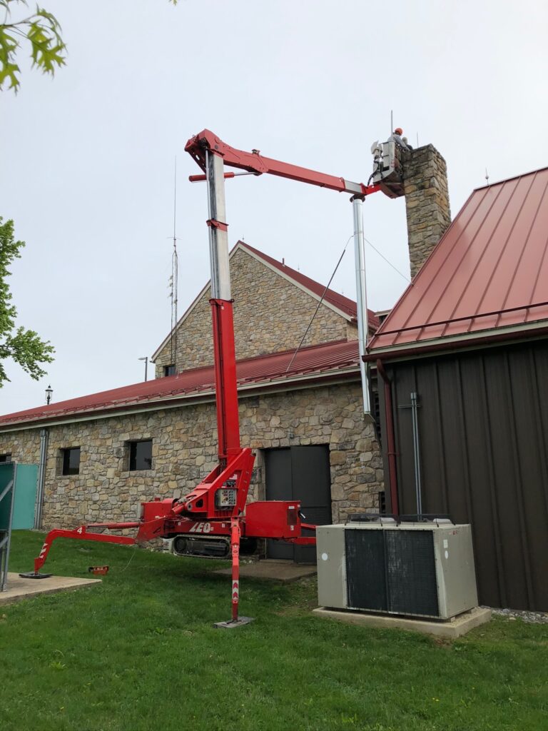 Chimney Techs In Lift on Install